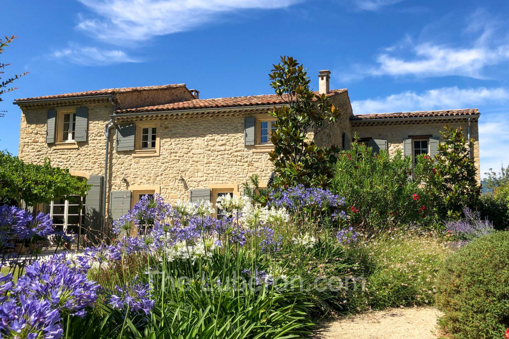 House and garden in flower
